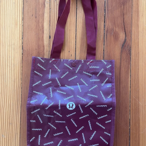 Lululemon Athletica Red Tote Bag with Elegant Design - Picture 1 of 5